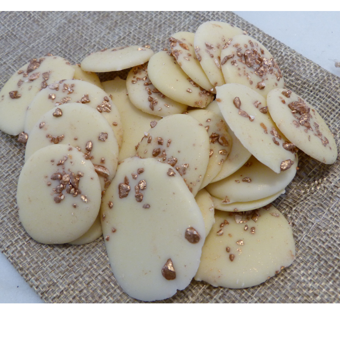 Palets de chocolat blanc pailletés